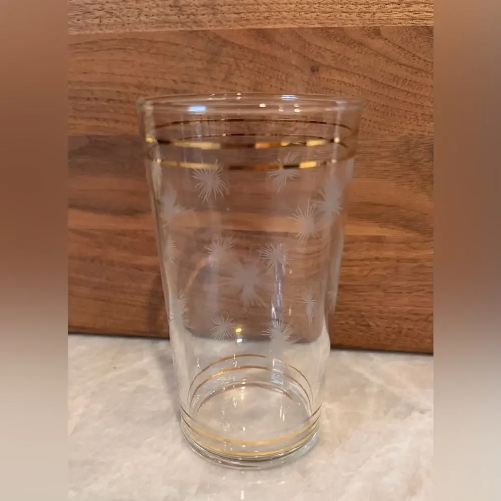 Vintage gold and clear etched starburst highball glass